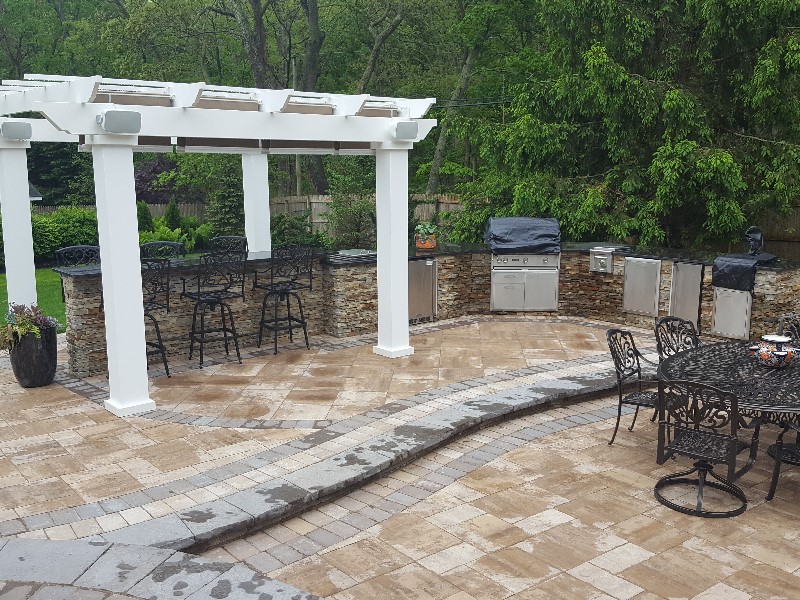 backyard patio with outdoor bar and kitchen island